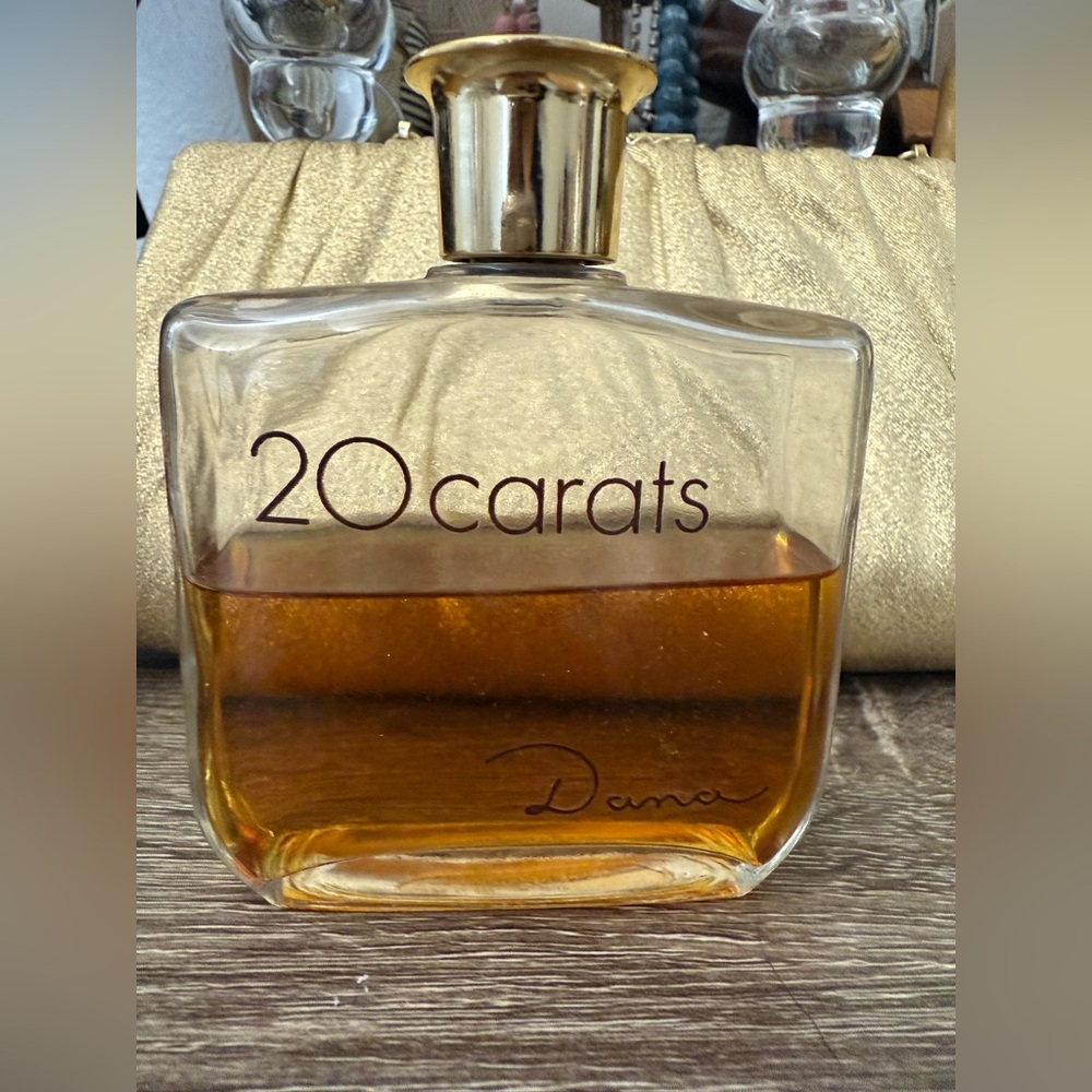 Vintage 4oz bottle of 20 Carats Eau de Parfum by Dana. Vintage perfume 50% full